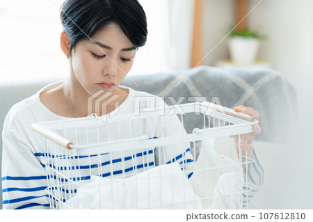 A woman who hates housework A woman who hates housework 107612810