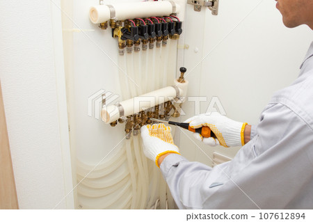 Inspection, maintenance, and repair image of residential hot water floor heating equipment Inspection, maintenance, and repair image of residential hot water floor heating equipment 107612894