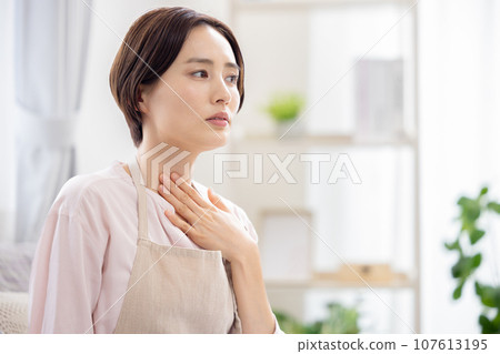 Housework: A woman who is unwell Housework: A woman who is unwell 107613195
