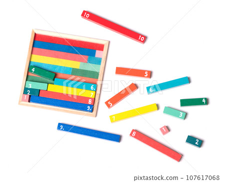 Wooden counting rods used to calculate mathematics using colour and shape in early school books 107617068