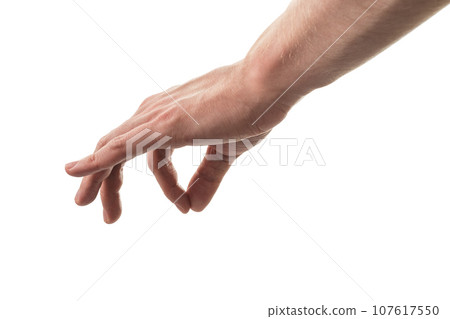 Man hand pick something with fingers isolated on white Man hand pick something with fingers isolated on white 107617550