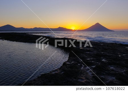 Sunrise at Mt. Kaimondake against a clear sky seen from Banshohana Nature Park, Minamikyushu City, Kagoshima Prefecture_Ver1 Sunrise at Mt. Kaimondake against a clear sky seen from Banshohana Nature Park, Minamikyushu City, Kagoshima Prefecture_Ver1 107618022