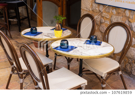 Open cafe restaurant in a small French village Open cafe restaurant in a small French village 107619859