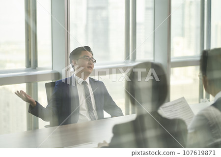 asian business man being interviewed by a team of hr executives in modern office 107619871
