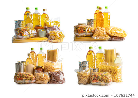 Foodstuff for donation, storage and delivery. Various food, pasta, cooking oil and canned food in cardboard box. 107621744