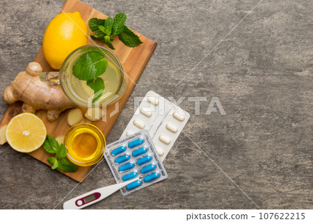 Natural cold and flu home remedies. Natural ingredients for immunity stimulation and viruses protection. top view flat lay 107622215