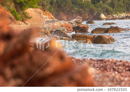 Wild red rocks beach Crvena Glavica, Montenegro 107622503