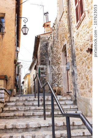 View of an alley in a small village in the south of France 107623053