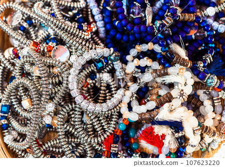Many bodhi tree rosary and bracelets with white beads in the vietnamese market Many bodhi tree rosary and bracelets with white beads in the vietnamese market 107623220