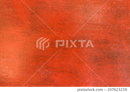 Wooden shabby wall painted with red paint Wooden shabby wall painted with red paint 107623239