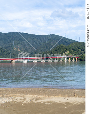 Scenery of Aoto Bridge, Inumizaki (Oshima Peninsula) and Obama Bay. Oi Town, Oi District, Fukui Prefecture. (Vertical composition) 107624143