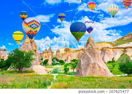 Fly of air balloons in Unique natural place - Cappadocia , Turkiye. 107625477