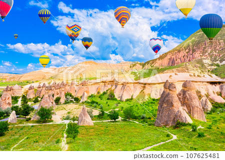 Fly of air balloons in Unique natural place - Cappadocia , Turkiye. Fly of air balloons in Unique natural place - Cappadocia , Turkiye. 107625481