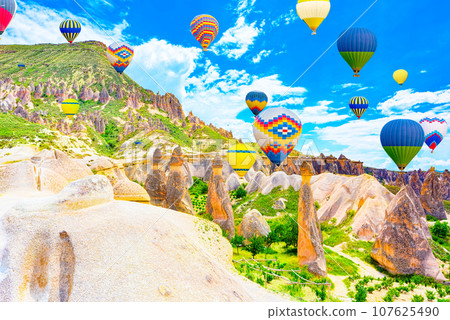 Fly of air balloons in Unique natural place - Cappadocia , Turkiye. Fly of air balloons in Unique natural place - Cappadocia , Turkiye. 107625490