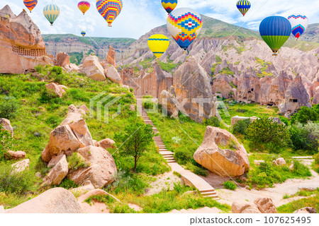 Fly of air balloons in Unique natural place - Cappadocia , Turkiye. 107625495