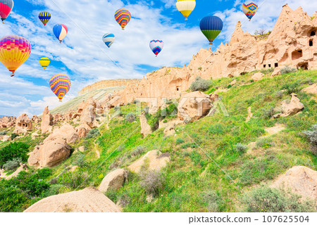 Fly of air balloons in Unique natural place - Cappadocia , Turkiye. 107625504