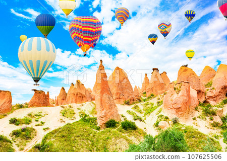 Fly of air balloons in Unique natural place - Cappadocia , Turkiye. Fly of air balloons in Unique natural place - Cappadocia , Turkiye. 107625506
