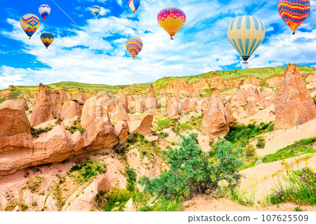 Fly of air balloons in Unique natural place - Cappadocia , Turkiye. Fly of air balloons in Unique natural place - Cappadocia , Turkiye. 107625509