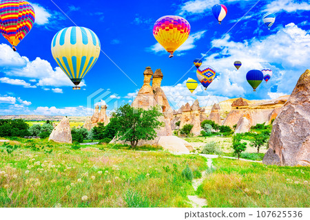 Fly of air balloons in Unique natural place - Cappadocia , Turkiye. Fly of air balloons in Unique natural place - Cappadocia , Turkiye. 107625536