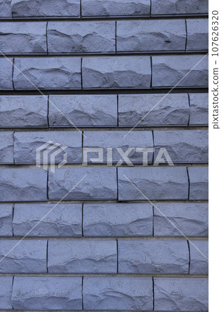 Gray-toned decorative block texture material | For exterior, landscaping, and web background designs Gray-toned decorative block texture material | For exterior, landscaping, and web background designs 107626320