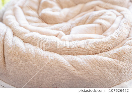 Blanket rolled up in storage bag Blanket rolled up in storage bag 107626422