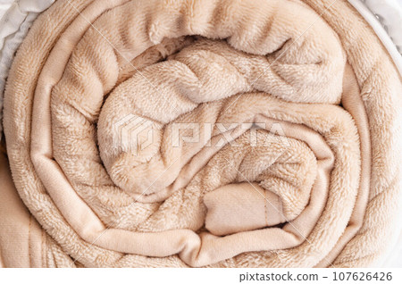 rolled up blanket 107626426