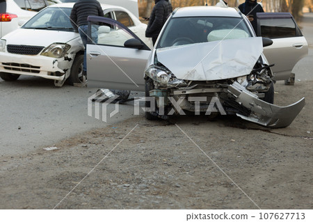 Car crash accident damage wreck vehicle in street traffic. 107627713