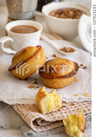 Pasticciotto leccese pastry filled with egg custard cream on a napkin close up 107628283