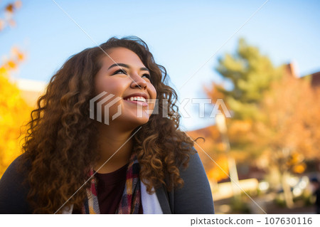 Confident Hispanic Student on Campus Confident Hispanic Student on Campus 107630116