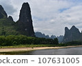A fire in a landscape painting seen on the Li River, a world heritage site in Guilin, China 107631005