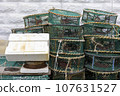 A sea port town piled with fishing nets, fishery-related tools 107631527