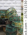 A sea port town piled with fishing nets, fishery-related tools 107631530