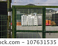 Fishing tools and props seen through the port city scenery and steel doors 107631535