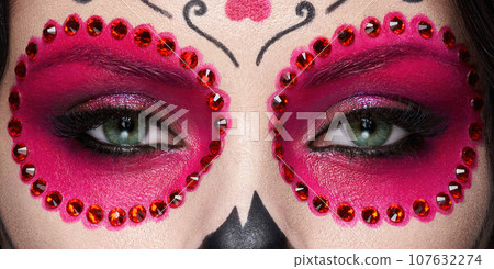 Beautiful female eyes with makeup sugar skull Beautiful female eyes with makeup sugar skull 107632274