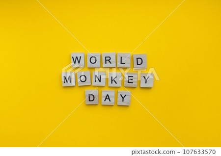 December 14, Monkey Day, minimalistic banner with the inscription in wooden letters December 14, Monkey Day, minimalistic banner with the inscription in wooden letters 107633570