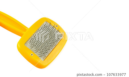 comb for grooming dogs isolated on white. Free space for text. Wide photo. comb for grooming dogs isolated on white. Free space for text. Wide photo. 107633977