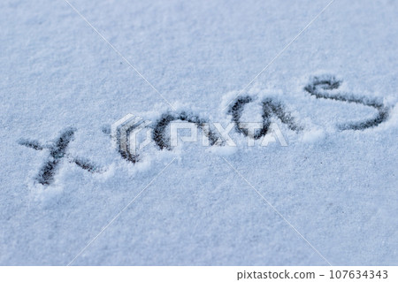 Inscription on the snow the word christmas 107634343