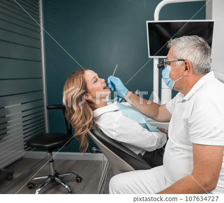 The patient receives individual advice on the health of their teeth and possible medical procedures. Dental implants are installed at the medical center to restore the functionality of the oral cavity 107634727