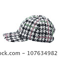 Cap-a baseball cap made of thick woolen fabric, with a visor, multi colored, isolated on a white background. Side view.  107634982