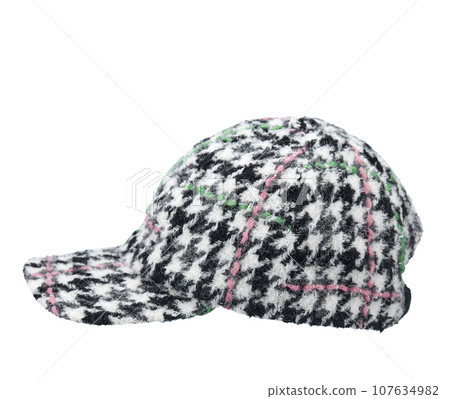 Cap-a baseball cap made of thick woolen fabric, with a visor, multi colored, isolated on a white background. Side view.  107634982