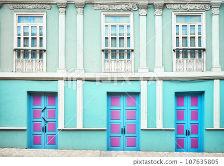 Street view of an old colonial building facade, architecture background, Cuenca, Ecuador. 107635805
