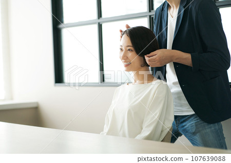 hair salon hairdresser and customer hair salon hairdresser and customer 107639088