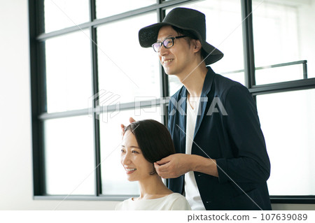 hair salon hairdresser and customer hair salon hairdresser and customer 107639089