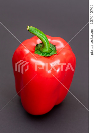 Red Bell Pepper on Black Background Red Bell Pepper on Black Background 107640763