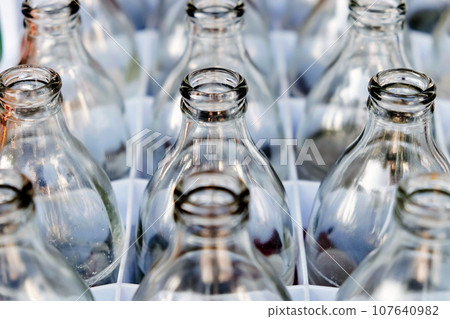 Empty bottles glass in Row. Empty bottles glass in Row. 107640982