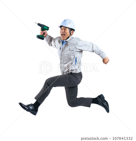 A middle-aged male worker jumping with an electric screwdriver, cutout background transparent PNG A middle-aged male worker jumping with an electric screwdriver, cutout background transparent PNG 107641332