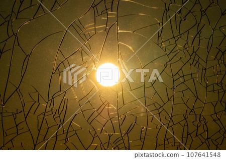 Sun through cracked glass afternoon 107641548