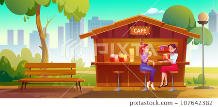 Woman sitting in city park outdoor street cafe Woman sitting in city park outdoor street cafe 107642382