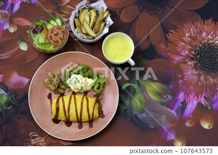Lunch Omelet rice Potato salad French fries Corn soup 107643573
