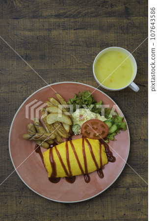 Lunch Omelet rice Potato salad French fries Corn soup Vertical position Lunch Omelet rice Potato salad French fries Corn soup Vertical position 107643586
